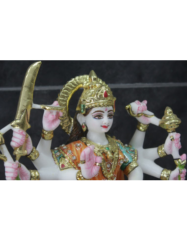 Close up of hand carved traditional details on real white marble amba maa murti